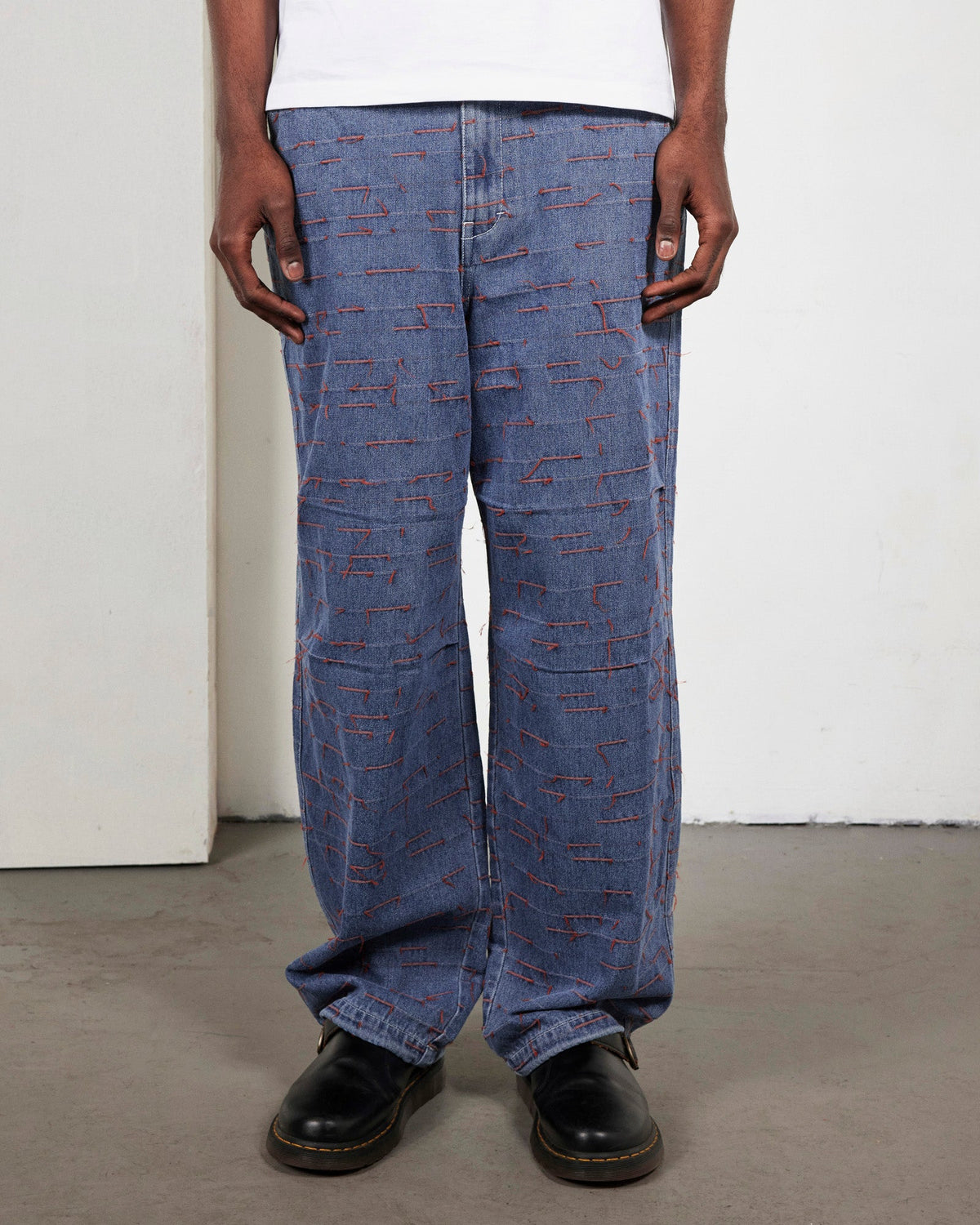 PLEASURES STROKES DENIM PARASHUTE PANTS