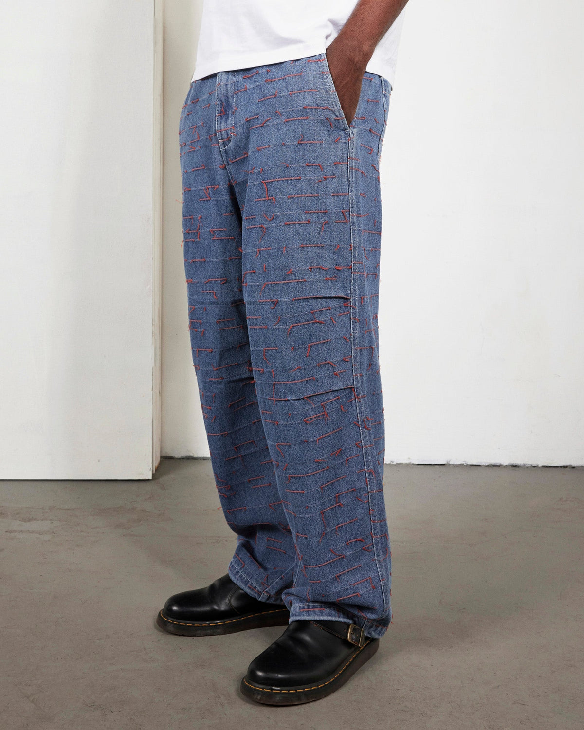 PLEASURES STROKES DENIM PARASHUTE PANTS