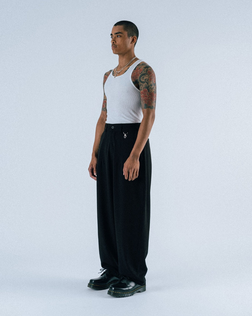 STUDENTS CALCULUS BAGGY PLEATED PANTS BLACK