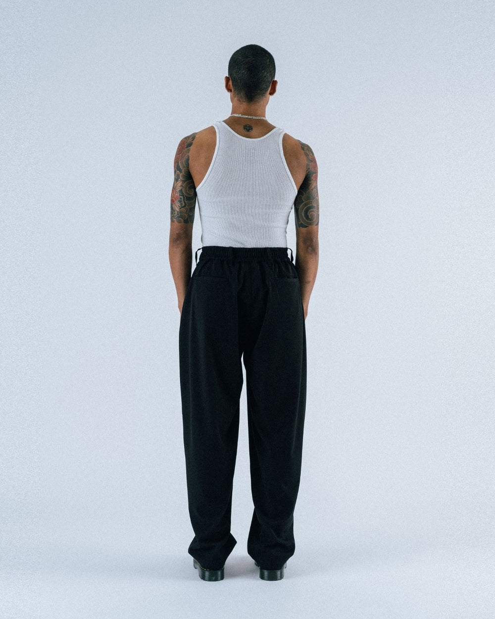 STUDENTS CALCULUS BAGGY PLEATED PANTS BLACK